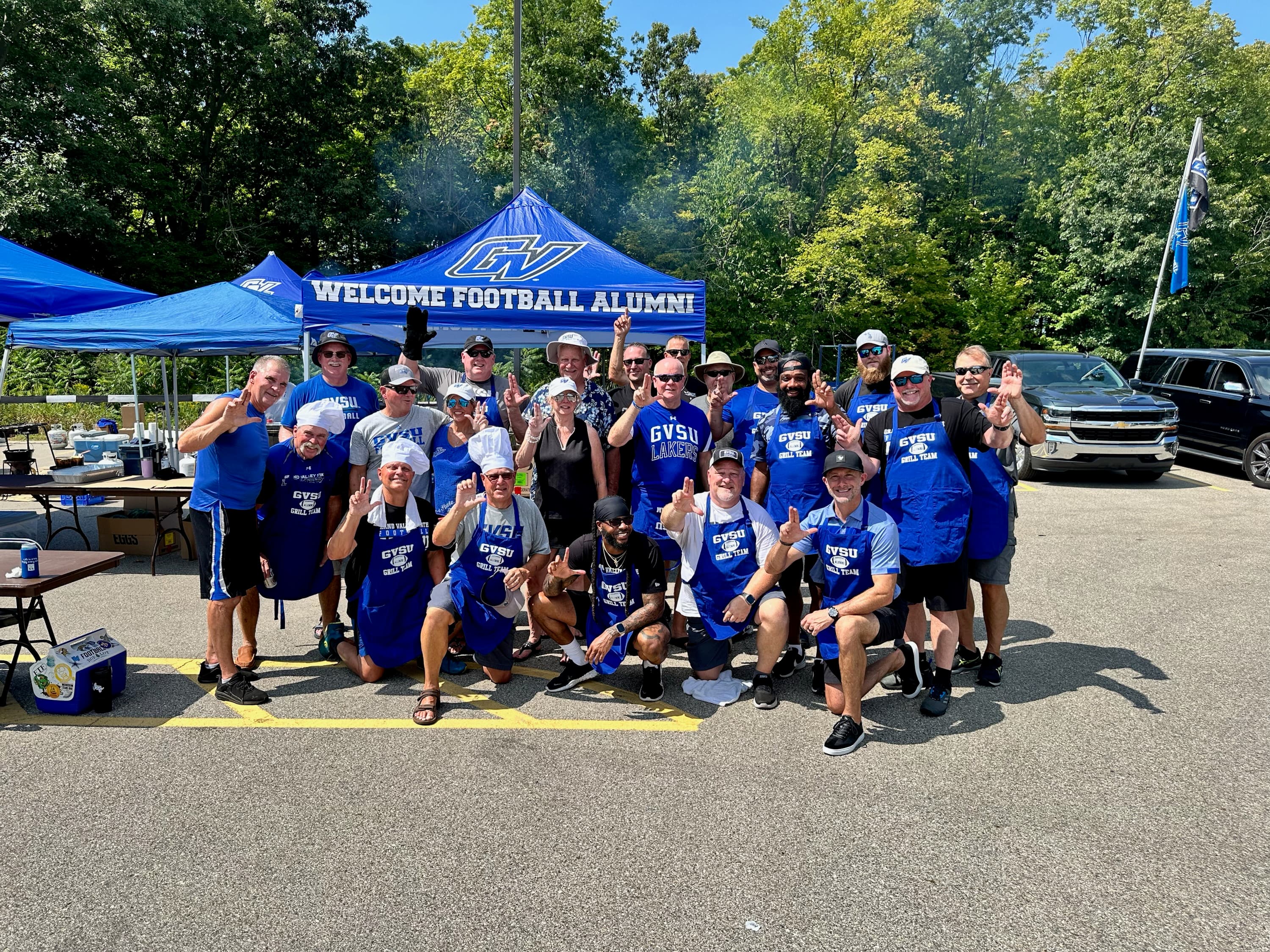 Grand Valley alumni and athletes at a community event